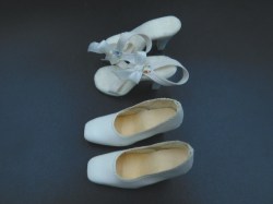 2 prs white tonner shoes a